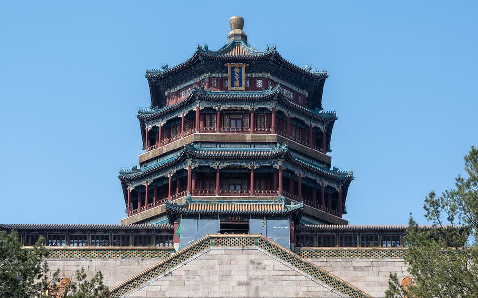 The multistorey Tower of Buddhist Incense rises beneath a clear sky at Beijing's Summer Palace