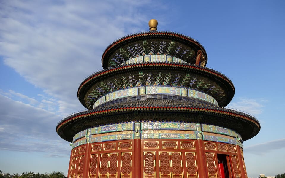 Hall of Prayer for Good Harvests rises against a blue sky at Beijing's Temple of Heaven