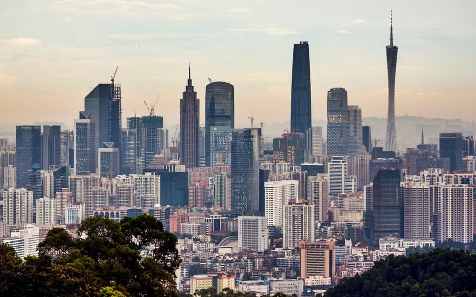 Guangzhou skyline with Canton Tower rising beside the Zhujiang New Town towers
