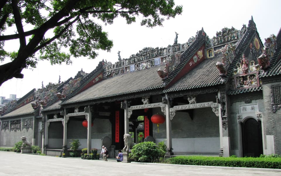 Ornately carved rooflines and grey-brick halls at the Chen Clan Ancestral Hall in Guangzhou