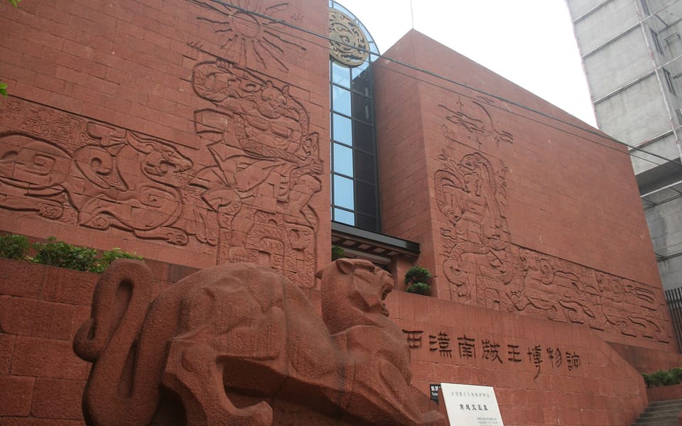 Red-stone facade and tiger sculpture at the Nanyue King's Tomb museum in Guangzhou