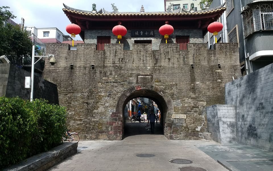 Stone south gate with red lanterns at Nantou Ancient Town in Shenzhen