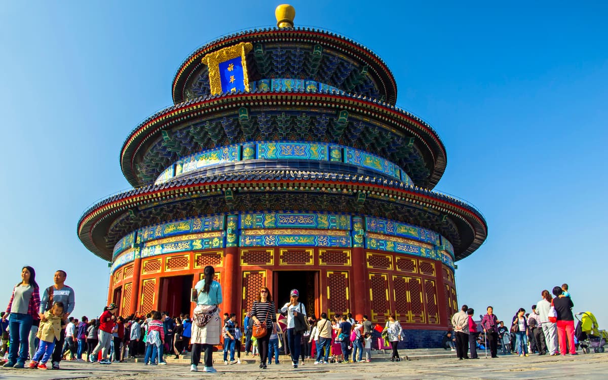 Hall of Prayer for Good Harvests at Beijing’s Temple of Heaven, with visitors in the courtyard